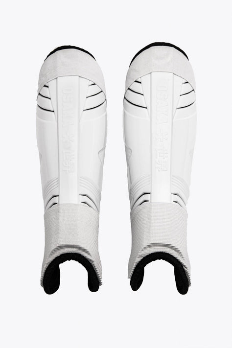 Osaka Hockey Shinguard | White-Black Osaka Shinguard white and black with logo. Front view