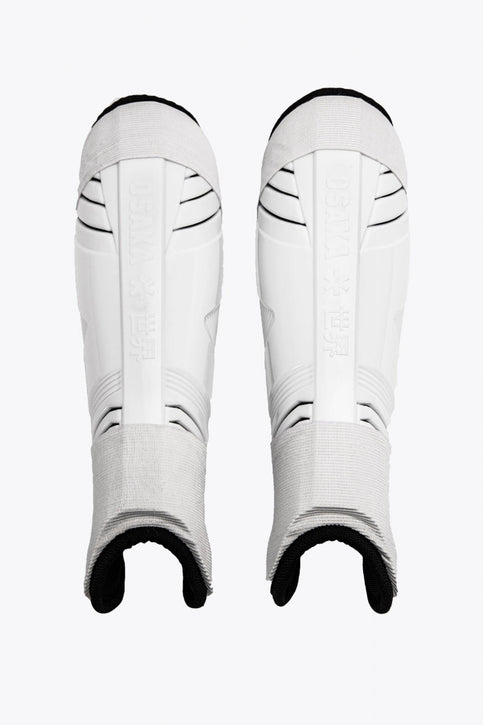 Osaka Hockey Shinguard | White-Black Osaka Shinguard white and black with logo. Front view