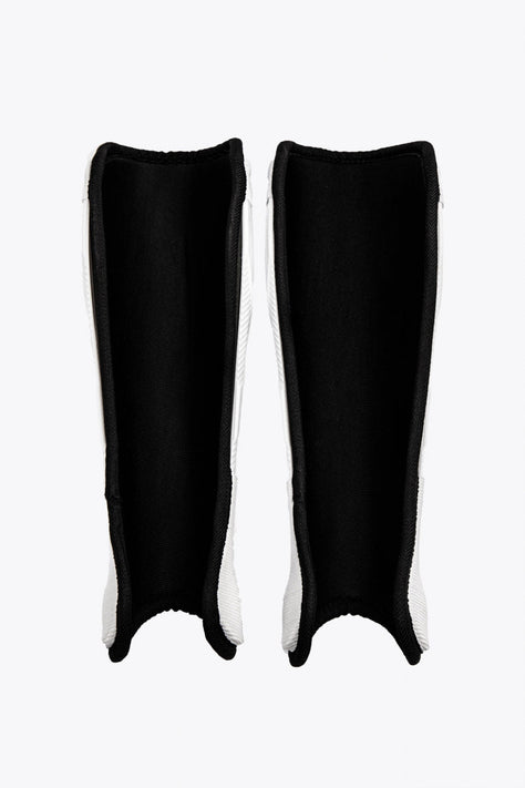 Osaka Hockey Shinguard | White-Black Osaka Shinguard white and black with logo. Front view