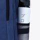 Osaka sports backpack in navy with logo in white and red. Detail water bottle holder view