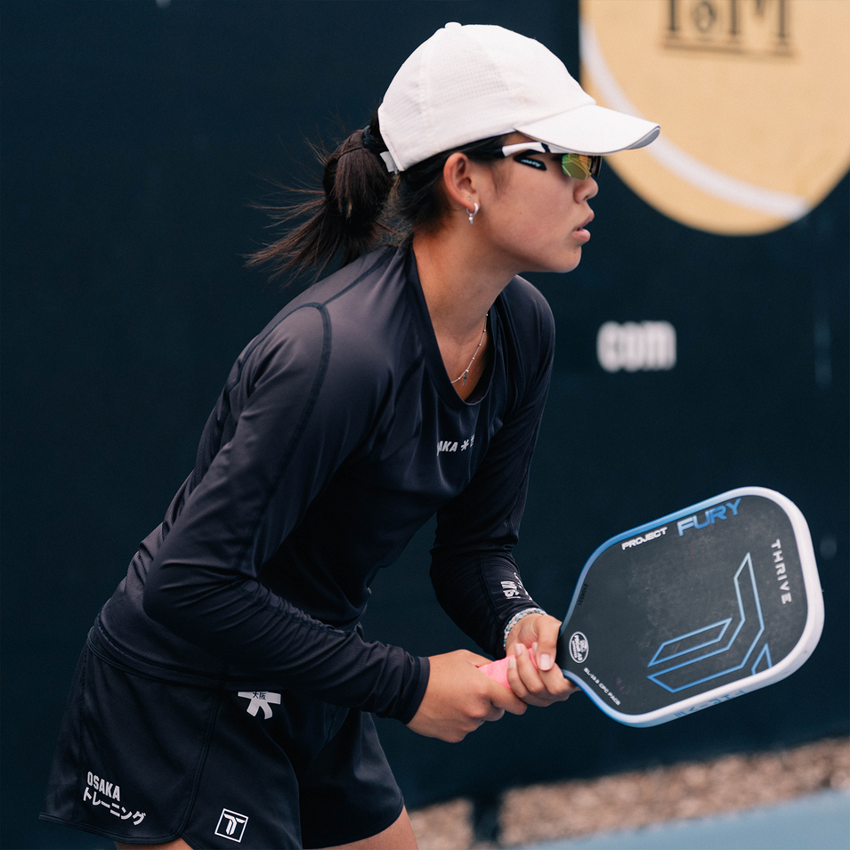 OSAKA Pickleball Athlete Averry Chew getting ready to return a serve