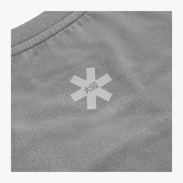 Reflective Osaka star logo detail on the upper back of the Osaka Men’s Apex Training Tee in Quiet Gray performance fabric.