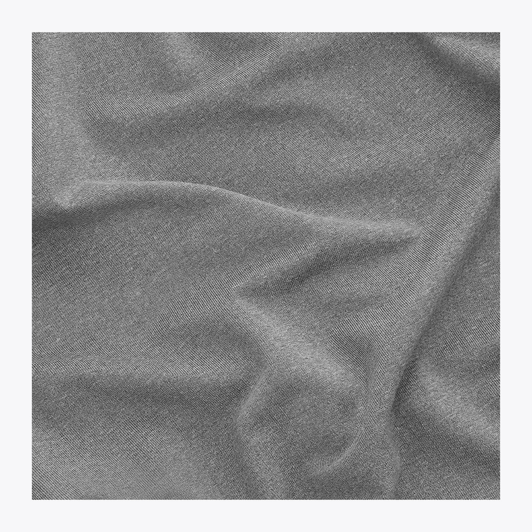 Close-up of the breathable performance fabric texture of the Osaka Men’s Apex Training Tee in Quiet Gray, designed for training and active wear.