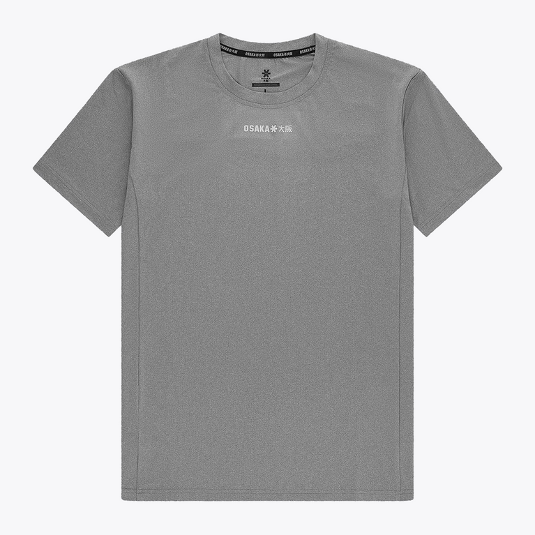 Osaka Men’s Apex Training Tee in Quiet Gray with reflective chest logo, lightweight moisture-wicking fabric, and athletic training fit.