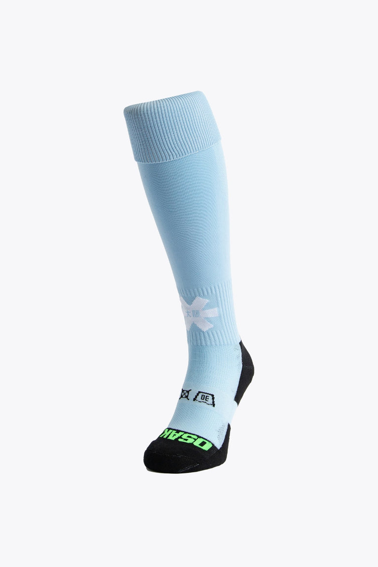 Osaka Field Hockey Socks in light blue with Osaka logo in green. Front view