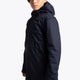 Boy wearing the Osaka Kids Stadium Jacket in Navy. Side view