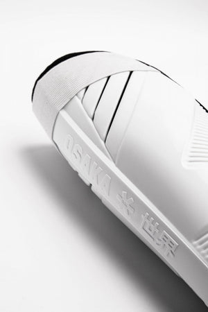 Osaka Shinguard white and black with logo. Close view