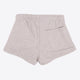 Osaka women shorts in grey with neon green logo. Back flatlay view