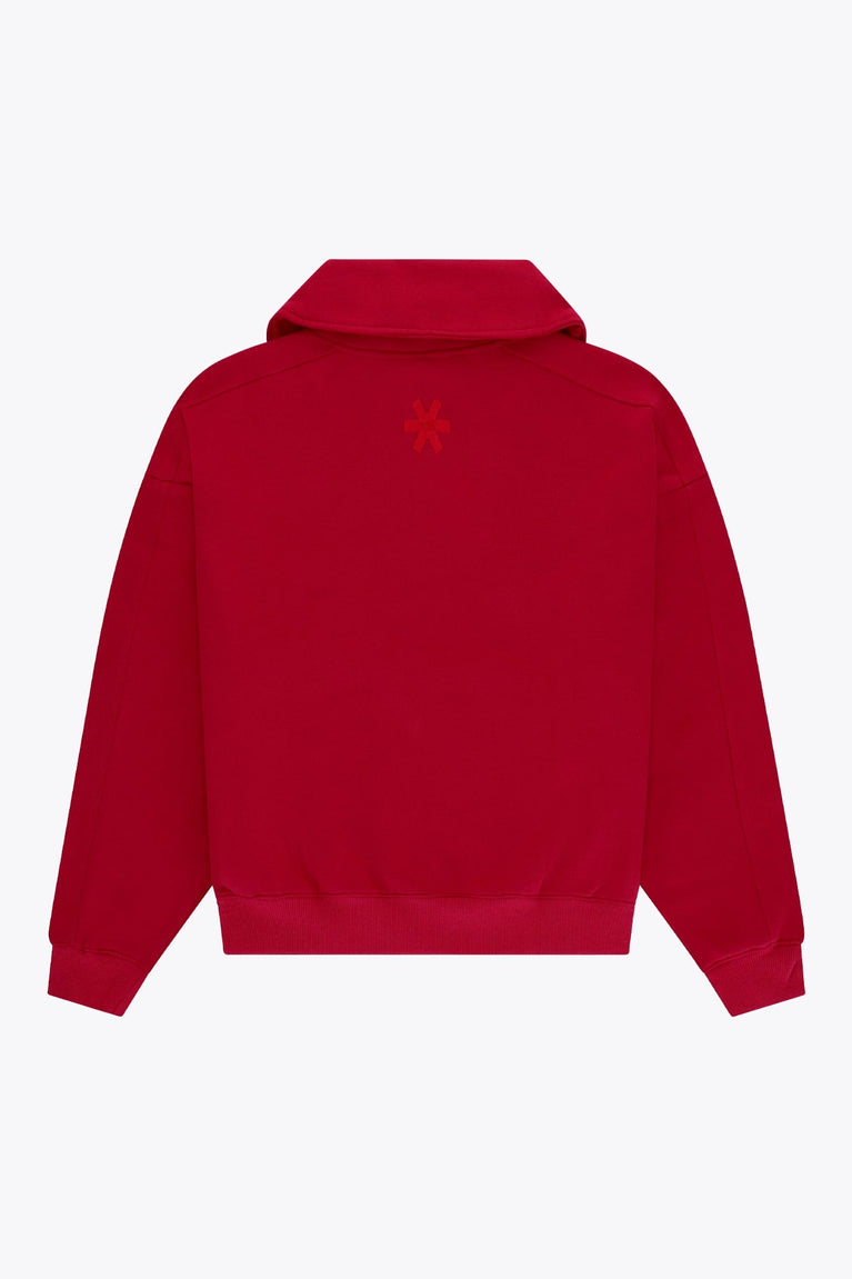 Osaka women half zip sweater in red with white logo. Back flatlay view