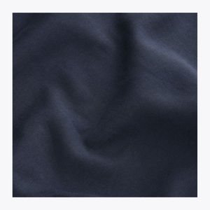 Navy knit sweater fabric close-up with smooth, dense texture #Navy