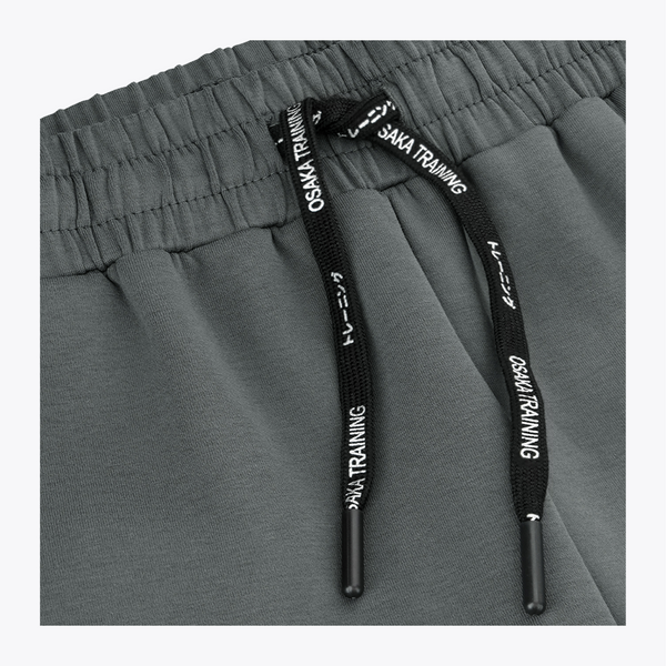 Dark grey sweatpants waistband with elastic casing and black drawstring #DarkGreyMelange