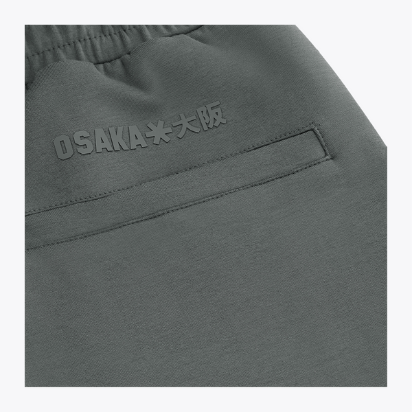 Dark grey sweatpants with raised logo print near the waistband #DarkGreyMelange