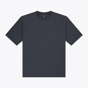A navy boxy crewneck t-shirt with a small tonal embroidered logo on the left chest, displayed flat against a light gray background. #Navy