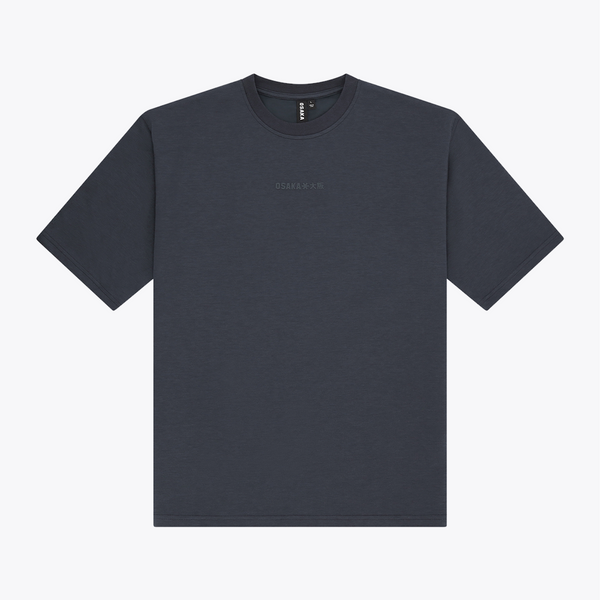 A navy boxy crewneck t-shirt with a small tonal embroidered logo on the left chest, displayed flat against a light gray background. #Navy