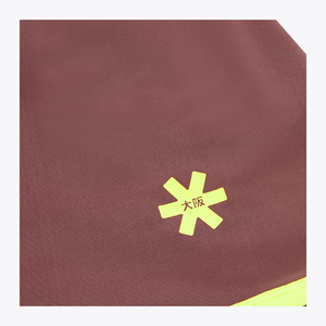 Osaka Women Floucy Active Skort| #Peppercorn | Close up of logo