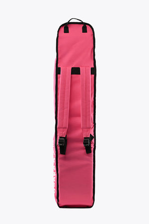 Hot pink padded stickbag with black top and front closure straps