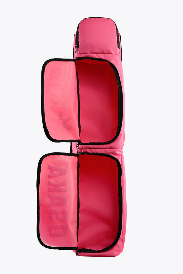 Hot pink medium stickbag with two main padded compartments and black edging
