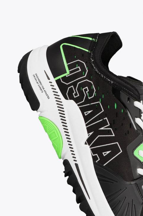 Osaka footwear Ido Mk1 in black and green with logo in black. Side view