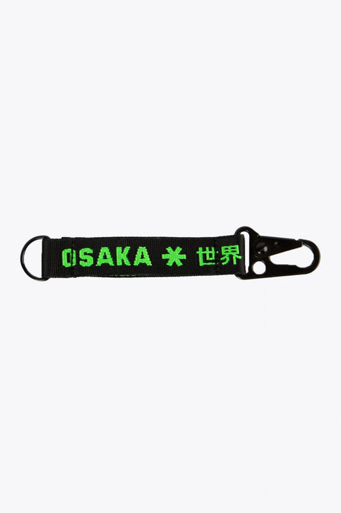 Osaka keychain in black with logo in green