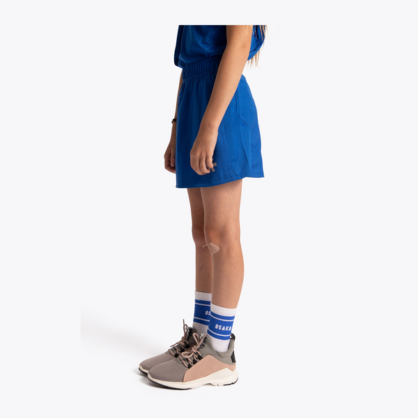 Osaka Kids Training Skort #RoyalBlue | side of model