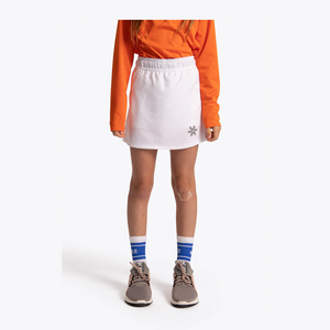 Osaka Kids Training Skort #White | Skort on bottom of model
