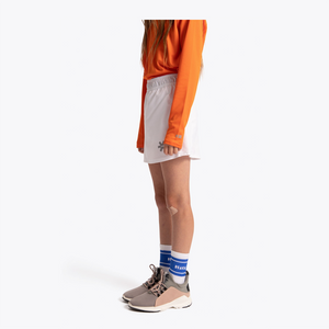 Osaka Kids Training Skort #White | side of skort on model