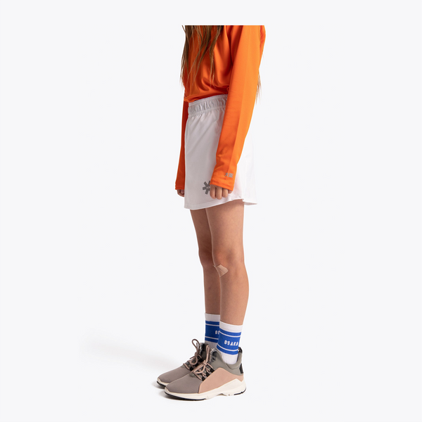 Osaka Kids Training Skort #White | side of skort on model