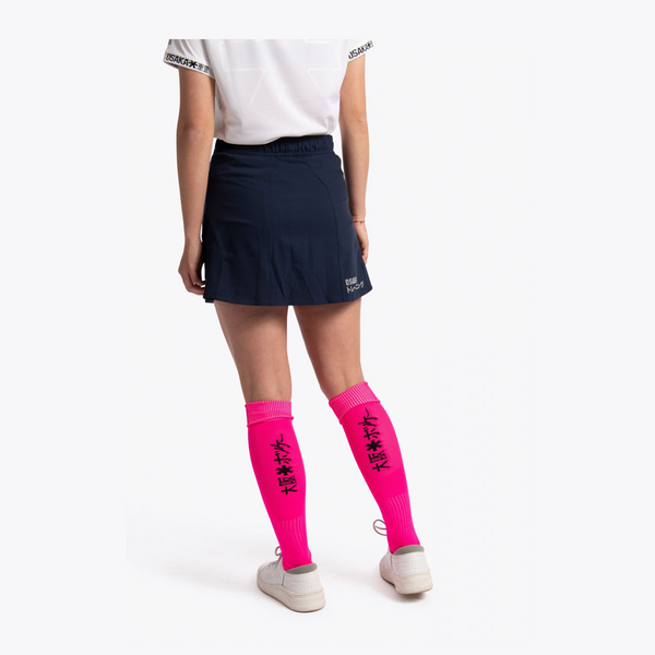 Osaka Women Training Skort #Navy | mid section of model wearing skort from behind