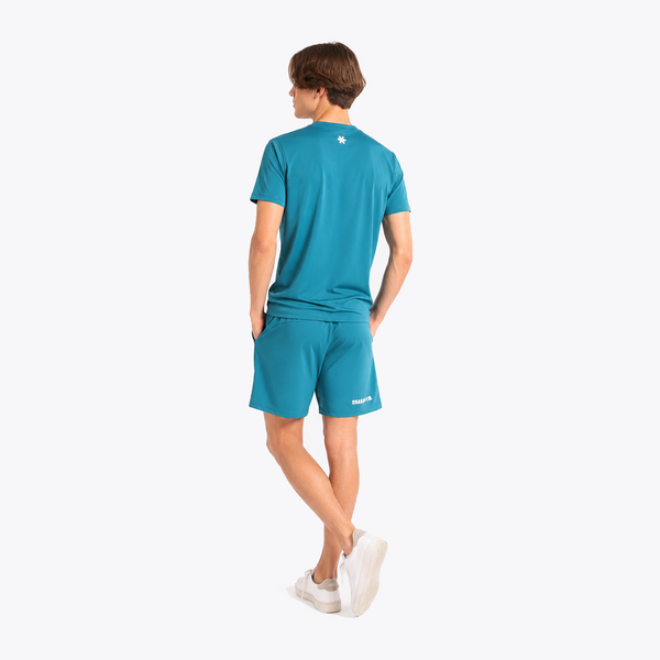 Osaka World Men Active Tee Transformative Teal | #Transformative-Teal | Back of Male Model