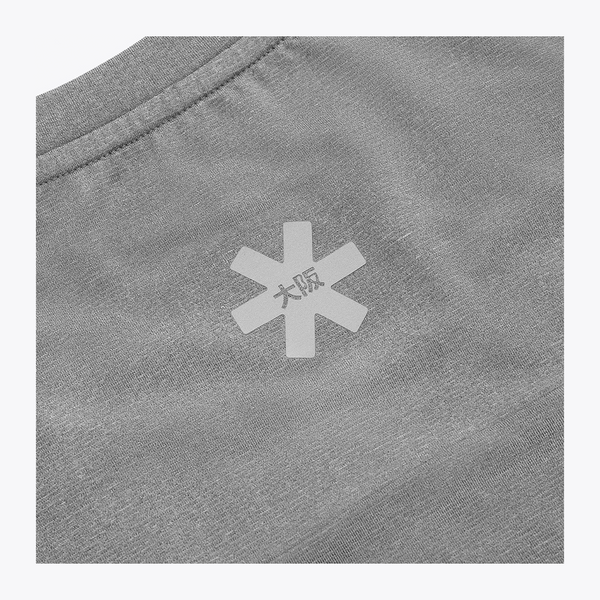 Reflective Osaka star logo detail on the upper back of the Osaka Men’s Apex Training Tee in Quiet Gray performance fabric. #QuiteGray