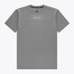 Osaka Men’s Apex Training Tee in Quiet Gray with reflective chest logo, lightweight moisture-wicking fabric, and athletic training fit. #QuiteGray