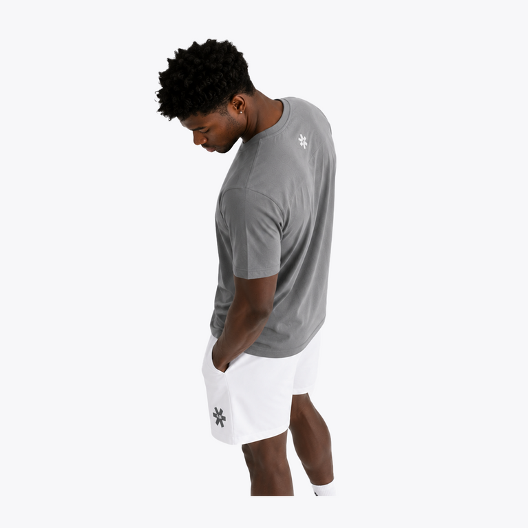 Side angle of Black male model wearing Osaka Men’s Apex Training Tee in Quiet Gray, highlighting premium performance fabric, athletic fit, and modern sportswear styling.