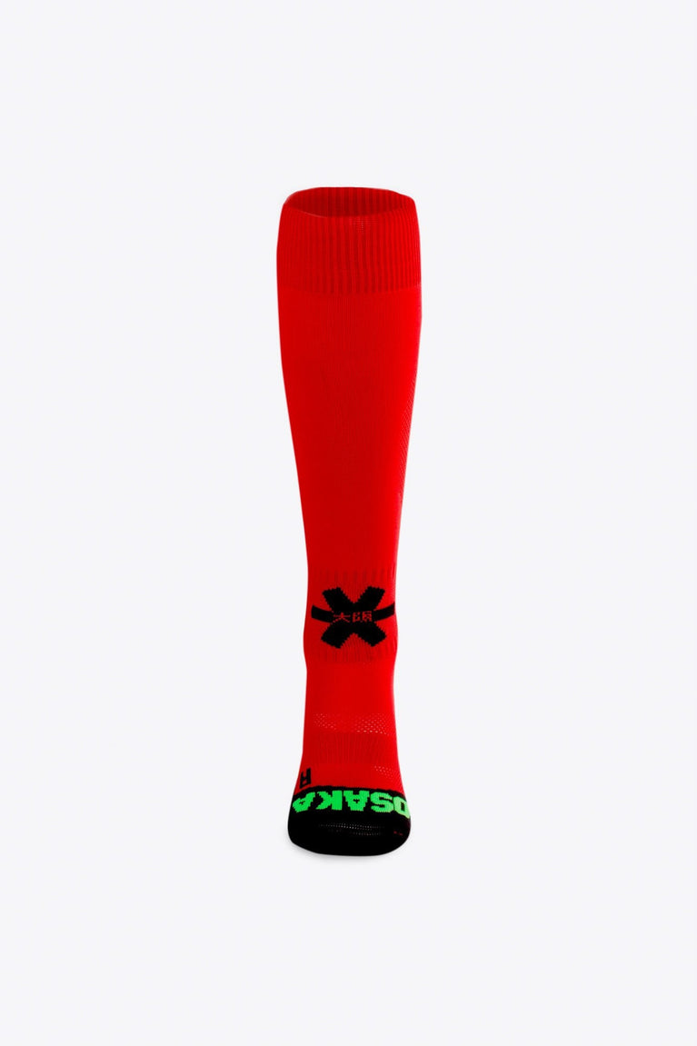 Osaka Field Hockey Socks in red with Osaka logo in green. Front view