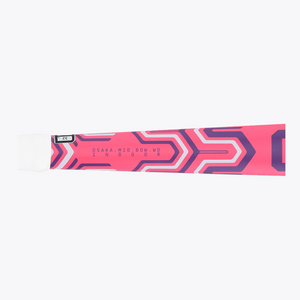 Orange indoor hockey stick shaft close-up with Osaka Mid Bow WD branding #HotPink