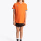Girl wearing the Osaka Kids Jersey in Orange. Front view