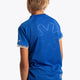 Boy wearing the Osaka Kids Jersey in Royal blue. Back view