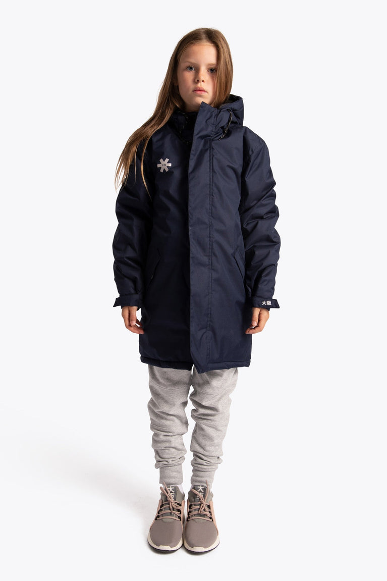 Girl wearing the Osaka Kids Stadium Jacket in Navy. Front view