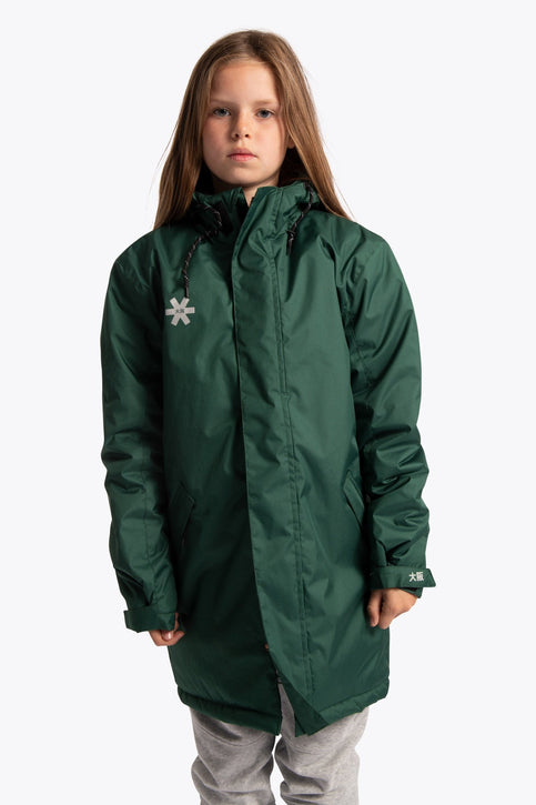 Boy wearing the Osaka Kids Stadium Jacket in Dark Green. Front view