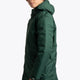 Boy wearing the Osaka Kids Stadium Jacket in Dark Green. Side view
