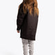 Girl wearing the Osaka Kids Stadium Jacket in Black. back view