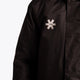 Osaka Kids Stadium Jacket in Black. Front detail logo view