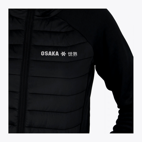 Close-up of a black puffer jacket with horizontal quilting, a front zipper, and white 'OSAKA' text with a star and Japanese character on the chest, shown against a light gray background. #Black