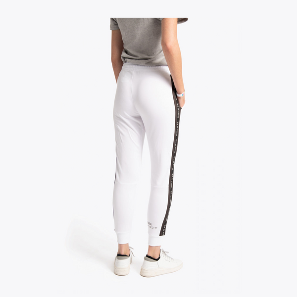 White athletic jogger pants with a black side stripe featuring white lettering, shown on a model from the back against a light gray background. #White